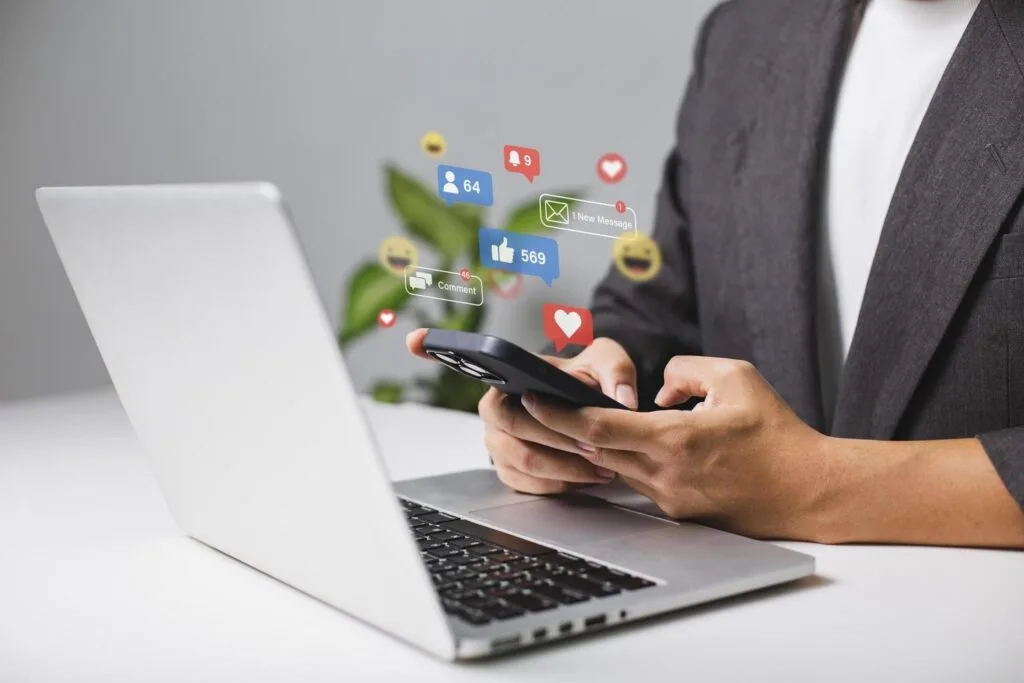 Man using laptop for live chat, social media, digital and online marketing in Cyprus