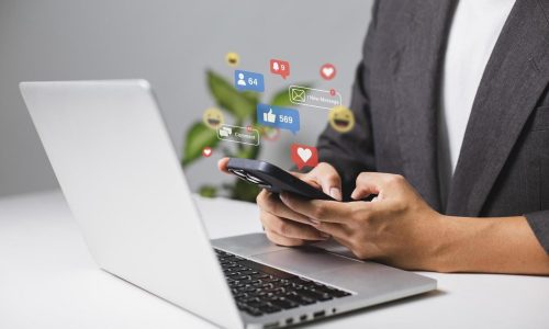 Man using laptop for live chat, social media, digital and online marketing in Cyprus